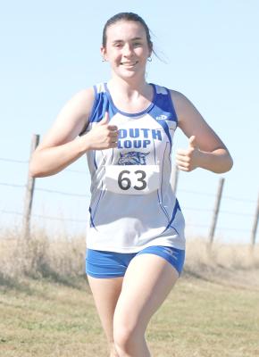 Ivy Tullis ran her fastest time ever on the Ravenna course on Sept. 19, and picked up the 6th place medal for the Bobcats. (Photo courtesy Anna Tullis)
