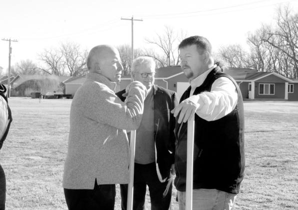 Ken Pitkin and Chris Smith enjoy a moment of conversation following the official groundbreaking in Callaway.
