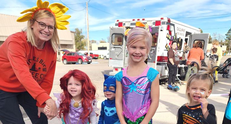 From the school staff and administration (above left) to downtown businesses, the whole community got involved in Callaway's annual Halloween Trunk-or-Treat. Seeing the grown-ups in costume is almost as much fun for the kiddos as raking in the candy! (School photo courtesy CPS; community photos courtesy Sarah Hogg)