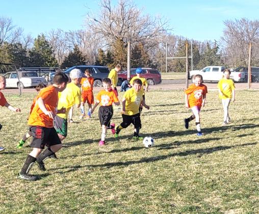 Above left: March in Custer County means Knights of Columbus Fish Fry’s on Friday nights, and on March 10 it was Callaway’s turn. Above right: Callaway youngsters were able to enjoy participating in the sport of soccer in their own town this spring, thanks to the efforts of Tessa Keeney.