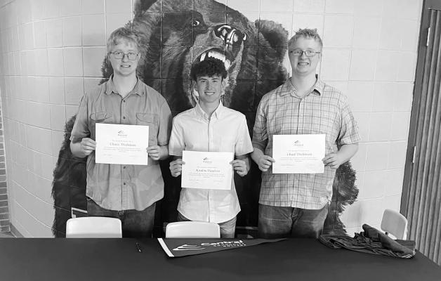 On May 9, Callaway High School hosted the final college signings of the year for the class of 2023. Twins Chad and Chase Dishman and Kaden Paulsen will all three attend Central Community College in Hastings this fall. (Photos courtesy CPS)