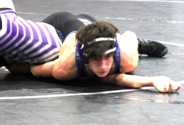 Ryan Lords gets the pin during the Southern Valley Duals on Dec. 15. (Courier photo by Brandy Mason)