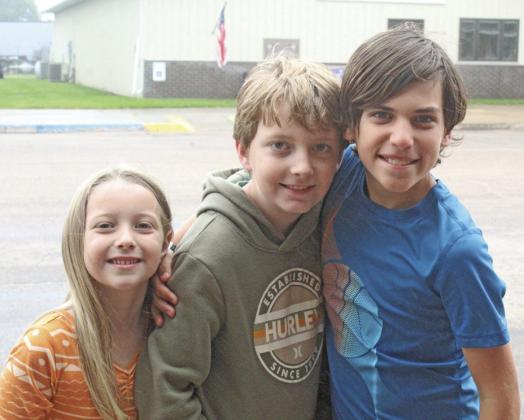 From left, Ellie and River Holland ran into their friend Everett Pitkin at the Pioneer Picnic parade. The kids all live in Lincoln and are the children of CHS Class of 2005 alumni Tara (Taul) Holland and Ryan Pitkin. (Courier photo by Ellen Mortensen)