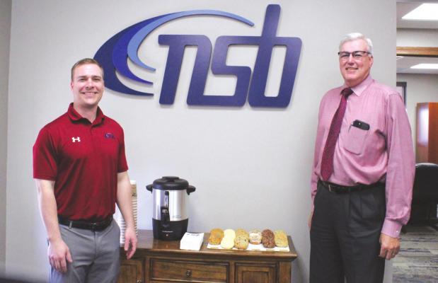 Jacob Parsons, left, is taking over as the new loan officer for the Nebraska State Bank Callaway branch. He will be replacing Craig Barta, right, who has served the community for nearly eight years. (Courier photo by Ellen Mortensen)