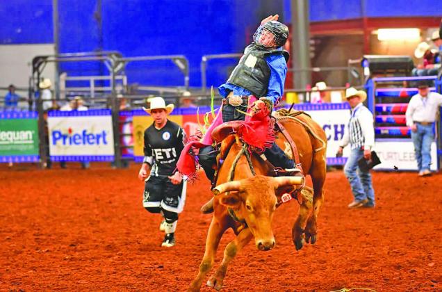 Callaway’s Quinton Boeser fights to complete his ride during the National Junior High Finals Rodeo in June, held in Guthrie, Oklahoma. (Photos courtesy Jennings Rodeo Photography)