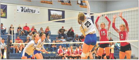 Delaynie Laible spikes the ball during play on Sept. 19 against Merna at Elm Creek's triangular. (Courier photos by Patti Schwarz)