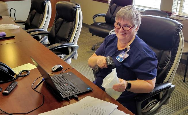 Diane Stryker, an RN at Callaway District Hospital, demonstrates the new Cerner electronic medical record system which includes software for better tracking supplies. The facility will transition to the new system completely on April 17. (Courier photo by Ellen Mortensen)