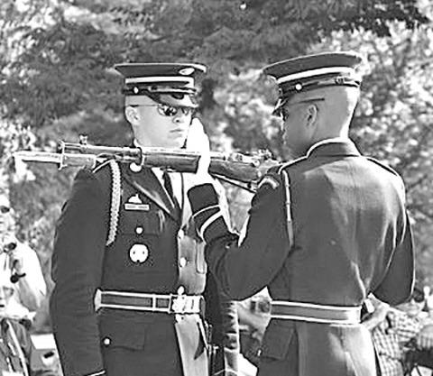 Changing of the guard at the Tomb of the Unknown in Arlington National Cemetery. (Photo by Ellen Mortensen)