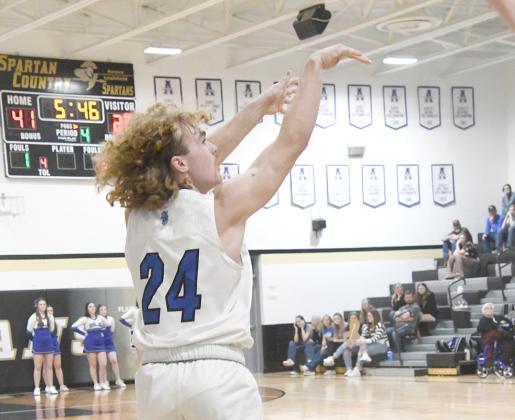 Junior Harper Johnson fires from the outside in the Bobcats first round Sub-District 53-39 victory over the Mavericks.