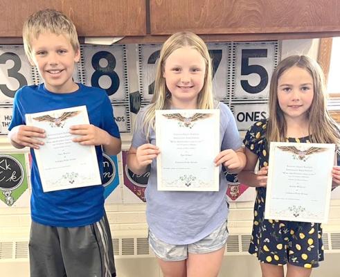 3rd grade Americanism essay winners: From left, 3rd place, Pryce Warren, 1st place, Piper Hoesel, 2nd place, Raelyn Williams.