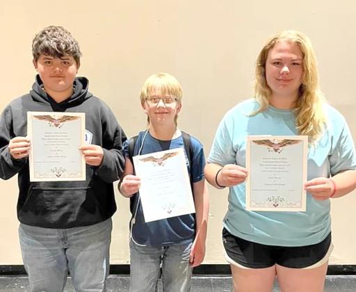 9th grade essay: 1st place; Taytum Wiese, 2nd place; Ashly Denney, 3rd place; Braxton Anderson. Not in order of the picture.