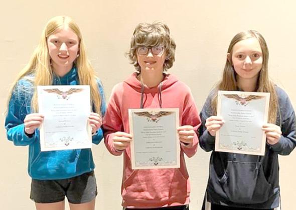 7th grade essay: From left, 1st place, Gracie Brennan, 2nd place, Callen Hickenbottom, and 3rd place, Tasia Trotter.