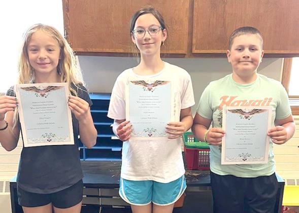 5th grade essay: From left, 1st place, Olivia Doggett, 2nd place, Fayth Duckett, and 3rd place, Wyatt Fetters.
