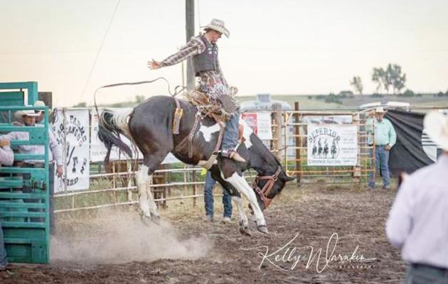 Callaway teen Kaleb Hurt is heading to the Nathionl High School Finals Rodeo this week ranked as the number 2 bronc rider in the state. (Photo courtey Kelly Warner Photography)
