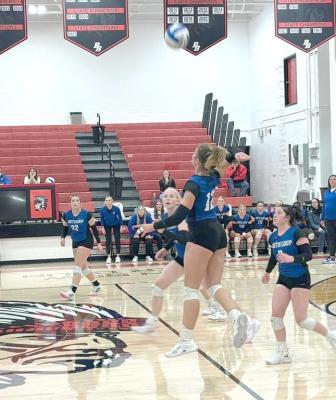 RIGHT; Charli Pandorf goes up for a kill during the MNAC tournament. (Courier photo by Jessica Tickle)