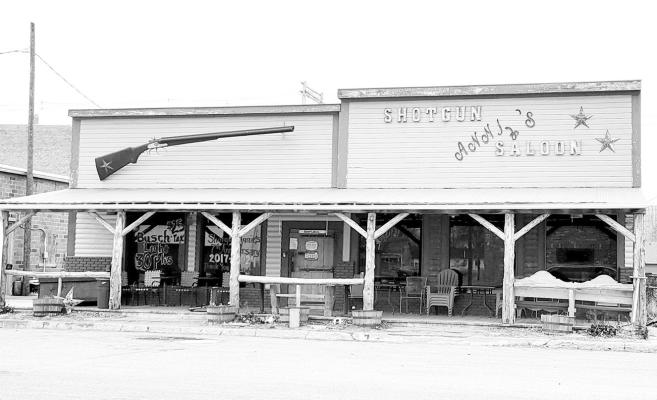 The 19-foot long shotgun on the top of the Callaway restaurant and bar was custom crafted by Terry Burnett specifically for Shotgun Annie's Saloon and Grill. (Courier photo by Ellen Mortensen)