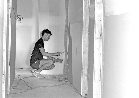 Brady Brestel is spending part of his summer working on the renovation of the former Masonic Temple building in Callaway. The project is nearing completion and will now house four office spaces and a community meeting room. (Courier photo by Ellen Mortensen)
