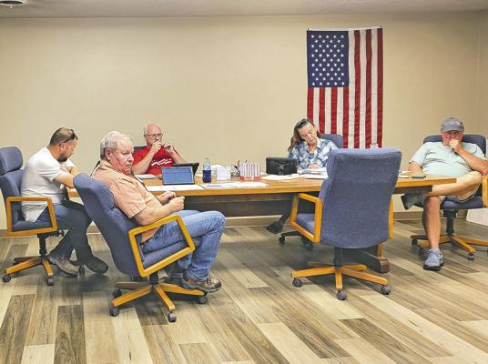 The Callaway Village Board heard from a representative of Nebraska Keno as well as Carla Kimball from the Central Nebraska Economic Development District on different topics affecting the Village at the Sept. 9 board meeting. From left are TJ Elliot, Dan Lewandowski, Lawrence Paulsen, Village Clerk Lori Bonde, and Chairman Mark Kimball. Darwin Mast was absent. (Courier photo by Ellen Mortensen)