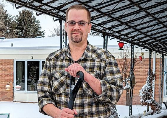 Callaway Good Life Center's new adminisstrator, Todd Sutherland, shoveling after the snow storm. (Photo courtesy Callaway Good Life Center)
