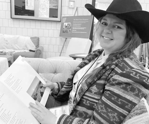 Natalie G'Schwind prepares for a reading at the National Cowboy Poetry Gathering in Elko, Nevada. (Photo courtesy Amy G'Schwind)