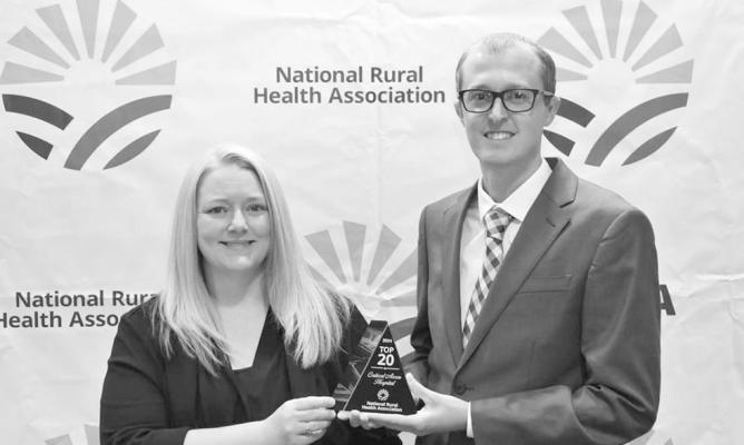 Cassie Penn, COO and Brett Eggleston, CEO of Callaway District Hospital accept the award for Top 20 Critical Access Hospital on Sept. 27. (Photo courtesy Callaway District Hospital)