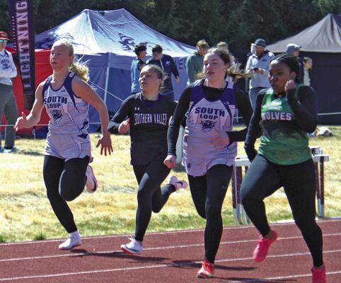 Asa Starr, left, and Olivia Fitzgerald ran the 100m for the Bobcats last week. They both also ran on the gold medal winning 4x100 Relay team.