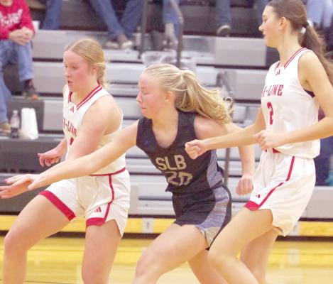 LEFT: Asa Starr goes after the ball as the Lady Bobcats ended their regular season against Hi-Line on Feb. 14. (Courier photos by Ronda McFate)