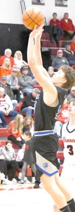 Left: Sophomore Crew Witthuhn shoots from up top in the Bobcats contest Saturday, Dec. 2, against Amherst.