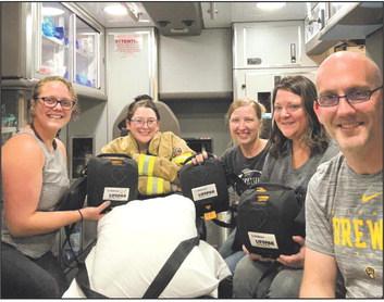 Callaway EMTs pose with the life-saving AEDs in the rescue unit. From left are Amber Harrison, Kacee Gillis, Jenny Robinson, Angie Ortiz, and EMT Chief Mark Buss. (Photo courtesy CVFD)