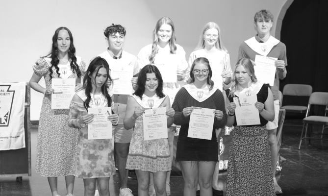 Above: CHS students inducted in the National Honor Society are front row, from left: Jozi Edgington, Greeley Hrupek, Angel Johnson, and Tyra Brestel; Back row: Kaygan Witthuhn, Dylan Pandorf, Aubrie Birkel, Chenney Dishman, and Conner Paulsen. Below: Josie Reiff, left, and Maggie Birkel received the Believers and Achievers Award. (Photos courtesy CPS)