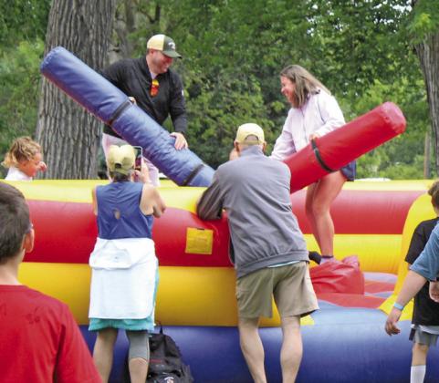 The kids weren’t the only ones who got in on the fun of Rockit Event Pros’ inflatables in the park on Saturday, June 27. These grown-ups seemed to be having a pretty good time as well!