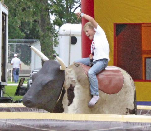 The mechanical bull in the park was a hit, as kids of all ages took a turn at trying to hold on for eight seconds. Very few accomplished that.