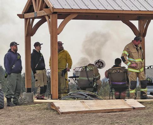 Volunteer firefighters from all across the state have been converging in central and northwest Nebraska to help get the massive wildfires that ignited last week under control. Personnel from across Custer County have also been assisting with fires near Halsey and Gothenburg. (Photo courtesy Luke Rickertsen)