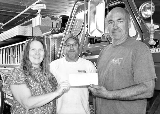 The Callaway Courier recently ran a special section in honor of Fire Prevention Week. Out of appreciation for our firefighters, 10 percent of all ad sales in that section were donated back to our local fire departments. Syndicate Publishing Advertising Executive Loleta Connell presented the check on behalf of the Leader to representatives of the Callaway Volunteer Fire Department. From left are Loleta Connell, Frank Potter (Asst Chief) and Dan Trumbull (Head Chief). (Courier photo)