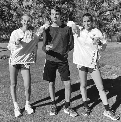 Ella Cool, Logan Recoy, and Ivy Tullis all qualified to run at the state cross country meet in Kearney on Friday. Cool and Recoy finished first and Tullis finished fourth. Photo courtesy of Nicole Recoy