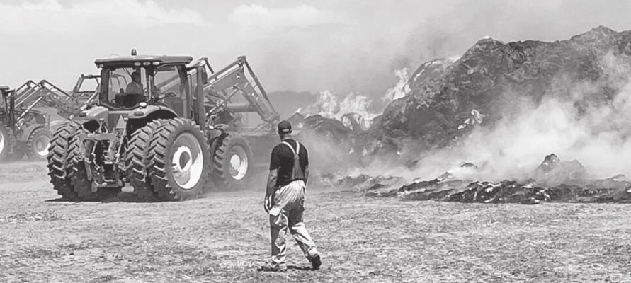 A firefighter monitors the fire off Pressey West Rd. Photo courtesy KCNI/KBBN
