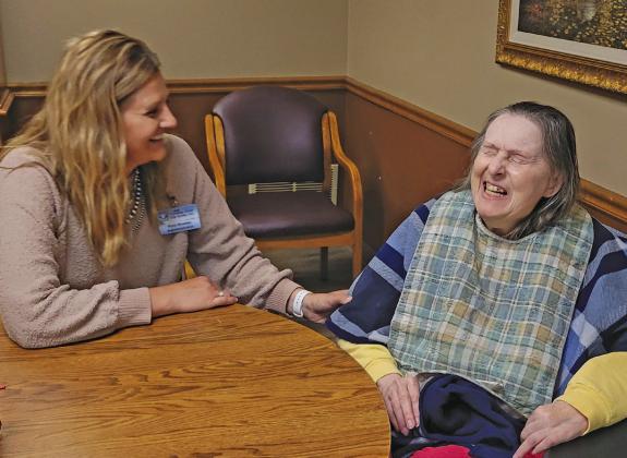 Callaway Good Life Center Administrator Roni Boeser, left, shares a moment with resident Marlis Miller. Boeser began her role as administrator at the facility in April and has resided with her husband and children in Callaway for about 10 years. (Courier photo by Ellen Mortensen)