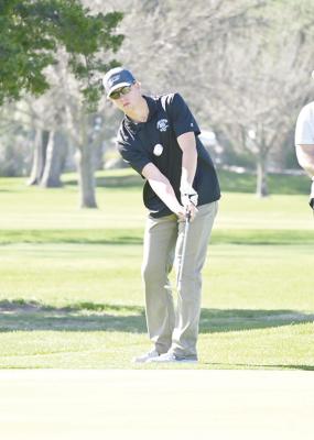 ABOVE: Crew Witthuhn chips the ball toward the hole at Hershey on April 17. (Photos courtesy Jessica Tickle) LEFT: Jamie Tickle lines up for a putt during the Hershey golf tournament last week. (Photos courtesy Jessica Tickle)