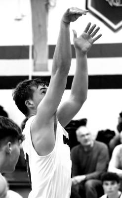(Top Right) Senior Lance Jones lines up to shoot from the charity stripe Friday against SEM. (Courier photos by Loleta Connell)