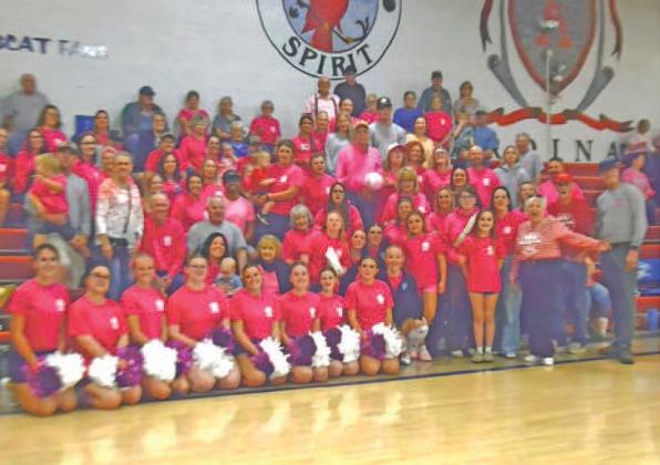 Nearly everyone in attendance at the South Loup v Cambridge volleyball game on Oct. 6 wore pink in support of those who have been diagnosed with breast cancer. October is National Breast Cancer Awareness Month, and the Lady Bobcats, along with their fans, teamed up with the Remund family to help raise awareness for screenings as a tribute to Riata. (Courier photos by Ronda McFate