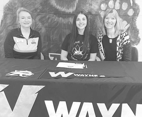 Jazlynn Bechtold, center, has signed her intent to attend Wayne State College next fall. Joining the Callaway High School senior. were the WSC representative and CPS Counselor Denise Sughayar. (Photo courtesy CPS)