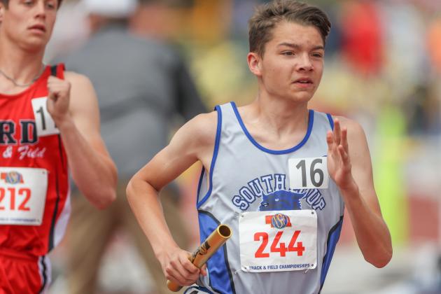 Logan Recoy ran a strong leg of the 4 x 800 meter relay May 20 in Omaha at the Class C State Track & Field Championships. (Courier photo by Corbey Dorsey)