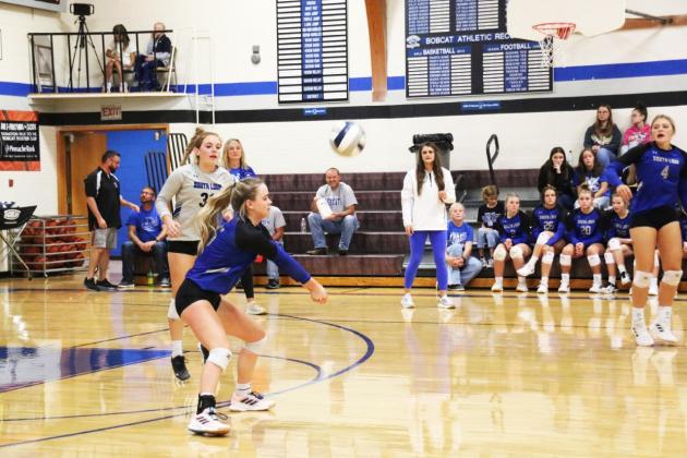 Bryn Schwarz passes the ball to the front row against Brady in the Seven Valleys Tournament on Saturday. 