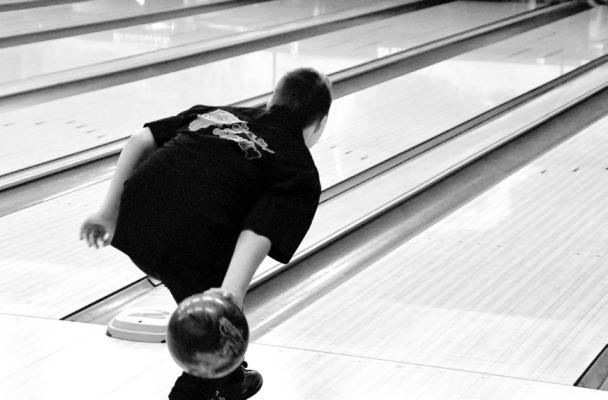 Alex Mills throws to pick up his first spare of the day.