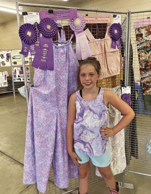 Kennedy Eggleston - Reserve Champion Bucket Calf Grand Champion Steam Clothing 1 and Best of Show