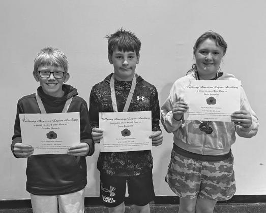 Sixth grade winners in the poster contest were, from left: Camden Gorsuch, third place; Jaxon Feddersen, second place; and Grace Stutzman, first place.