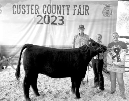Addison Stump was named Grand Champion with her heifer in the Commercial Class, and her group won Reserve Champion in the Fitting Show at this year’s Custer County Fair. (Photo courtesy Kim Stump)