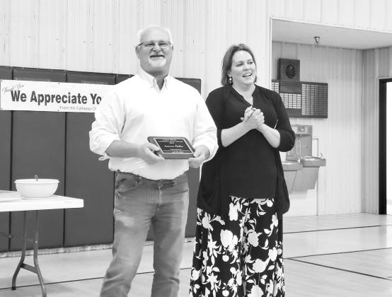 ABOVE: It was the end of the road at Callaway Public School for a dozen seniors who received their diplomas in May. The class celebrated with confetti. RIGHT: Lawrence Paulsen was named Citizen of the Year at the annual Chamber award ceremony in April. He was presented the award by Chamber President Brooke Moore.