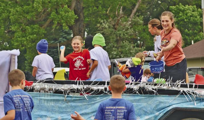 The United Methodist Church won the best church float category in the parade, as riders threw both candy and water balloons to the eager youngsters.
