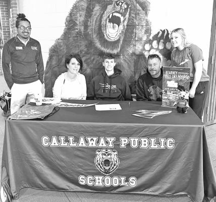 Last week Callaway senior Brady Brestel signed his certificate of intent to attend the University of Nebrska-Kearney this fall, where he will begin studies toward becoming a dental hygeinist. He was joined by his parents, sister, and UNK representative for the special event. (Photo courtesy CPS)